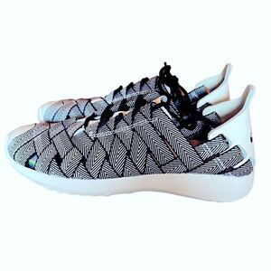 NIKE WOMEN WOMEN'S NIKE JUVENATE WOVEN PREMIUM.